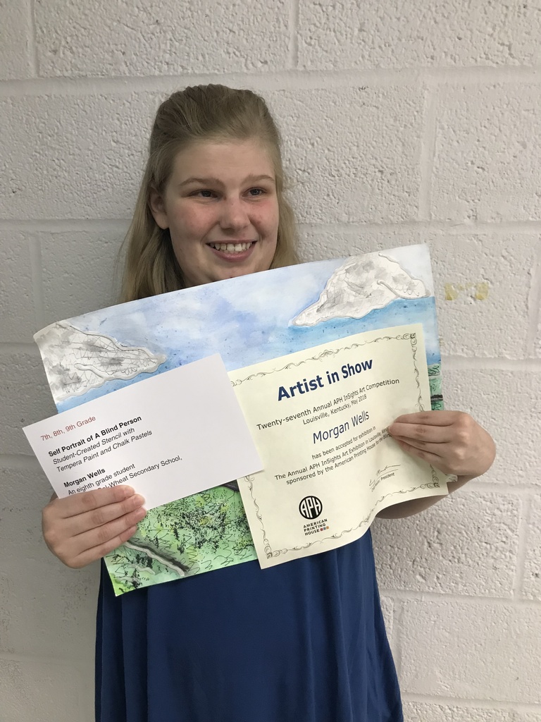 Morgan Wells and her certificate for Artist in Show Self Portrait of a Blind Person